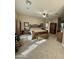 Spacious main bedroom suite with plush carpet, ceiling fan, and lots of light at 861 E Toledo St, Gilbert, AZ 85295
