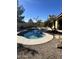 Large kidney-shaped pool with a built-in spa at 861 E Toledo St, Gilbert, AZ 85295