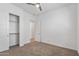 Bedroom with double door closet and neutral decor at 1113 E La Mirada Dr, Phoenix, AZ 85042