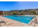 Inviting community pool area with ample seating at 1113 E La Mirada Dr, Phoenix, AZ 85042