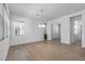 Spacious dining area with tile floors and access to other rooms at 1113 E La Mirada Dr, Phoenix, AZ 85042
