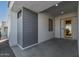 Side entry with gray siding and a yellow door at 1113 E La Mirada Dr, Phoenix, AZ 85042