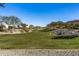Community greenbelt with grassy area and homes at 1113 E La Mirada Dr, Phoenix, AZ 85042