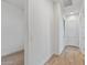 Clean and bright hallway with wood-look tile floor at 1113 E La Mirada Dr, Phoenix, AZ 85042
