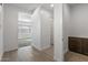 Hallway showcasing access to bedroom and bathroom at 1113 E La Mirada Dr, Phoenix, AZ 85042