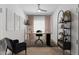 Bright home office features modern furnishings, neutral walls, and minimalist decor at 1113 E La Mirada Dr, Phoenix, AZ 85042