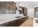 Spacious kitchen featuring stainless steel appliances and granite countertops at 1113 E La Mirada Dr, Phoenix, AZ 85042
