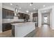 Modern kitchen with stainless steel appliances and an island at 1113 E La Mirada Dr, Phoenix, AZ 85042
