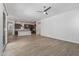 Open concept living room with tile floors and views of the kitchen at 1113 E La Mirada Dr, Phoenix, AZ 85042