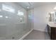 Large walk-in shower with glass enclosure and tile surround at 1113 E La Mirada Dr, Phoenix, AZ 85042