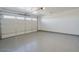 Attached garage with epoxy flooring and storage at 12503 W Jenero Dr, Arizona City, AZ 85123