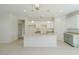 Spacious kitchen featuring granite countertops and gray cabinets at 12503 W Jenero Dr, Arizona City, AZ 85123