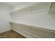 Large walk-in closet with double hanging rods at 12503 W Jenero Dr, Arizona City, AZ 85123