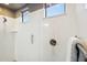 Bright white shower with modern fixtures and grab bars at 12756 W Caraveo Pl, Peoria, AZ 85383