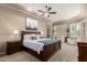 Spacious main bedroom with plush carpet and large windows at 17679 W Redwood Ln, Goodyear, AZ 85338