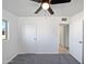 Spacious bedroom with ceiling fan and carpet flooring at 2044 E Weldon Ave, Phoenix, AZ 85016