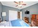 Bedroom with a double bed, ceiling fan and large closet at 21925 N 78Th Dr, Peoria, AZ 85383