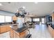 Open kitchen island with granite countertops and modern appliances at 21925 N 78Th Dr, Peoria, AZ 85383