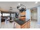 Open kitchen island with granite countertops and modern appliances at 21925 N 78Th Dr, Peoria, AZ 85383