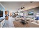 Spacious living room with tile floors and a view of the kitchen at 21925 N 78Th Dr, Peoria, AZ 85383