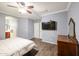 Main bedroom with walk-in closet and ceiling fan at 21925 N 78Th Dr, Peoria, AZ 85383