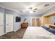 Main bedroom with walk-in closet and ceiling fan at 21925 N 78Th Dr, Peoria, AZ 85383
