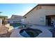 Inviting backyard with a kidney-shaped pool and spa at 21925 N 78Th Dr, Peoria, AZ 85383