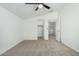 Spacious bedroom with two doors leading to other rooms and a walk-in closet at 22235 E Munoz Ct, Queen Creek, AZ 85142