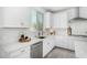 Well-lit kitchen with white cabinets, and stainless steel appliances at 22235 E Munoz Ct, Queen Creek, AZ 85142