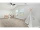 Loft area with a teepee, seating and plenty of natural light at 22235 E Munoz Ct, Queen Creek, AZ 85142