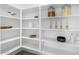 Bright and spacious walk-in pantry with ample shelving at 22235 E Munoz Ct, Queen Creek, AZ 85142
