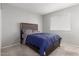 Cozy bedroom with a double bed and window coverings at 2875 W Highland St # 1190, Chandler, AZ 85224