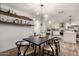 Bright kitchen features white shaker cabinets, quartz countertops, and stainless steel appliances at 3323 N 28Th St, Phoenix, AZ 85016