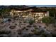 Luxury home with pool, desert landscaping, and mountain views at 38300 N 102Nd St, Scottsdale, AZ 85262
