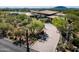 Luxury home with a long driveway and desert landscaping at 38300 N 102Nd St, Scottsdale, AZ 85262