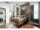 Spa-like bathroom with floating vanity and large shower at 38300 N 102Nd St, Scottsdale, AZ 85262