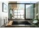 Bathroom with soaking tub and views to outside at 38300 N 102Nd St, Scottsdale, AZ 85262