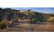 Relaxing desert outlook with scenic seating area and mountain views at 38300 N 102Nd St, Scottsdale, AZ 85262