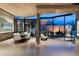 Bright, modern dining room with open floor plan, desert views, and stylish decor at 38300 N 102Nd St, Scottsdale, AZ 85262