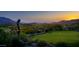 Golf course with a statue and sunset view at 38300 N 102Nd St, Scottsdale, AZ 85262