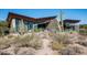 Contemporary home with unique angular design and desert landscaping at 38300 N 102Nd St, Scottsdale, AZ 85262