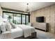Lovely main bedroom featuring designer accents, recessed lighting, and private courtyard view at 38300 N 102Nd St, Scottsdale, AZ 85262
