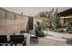 Desert landscape with fire pit and seating at 38300 N 102Nd St, Scottsdale, AZ 85262