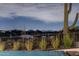 Relaxing pool area showcasing incredible views of the cityscape at night at 38300 N 102Nd St, Scottsdale, AZ 85262