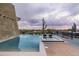 Stunning pool and spa with desert landscape, mountain views, and lounge area for upscale outdoor living and entertaining at 38300 N 102Nd St, Scottsdale, AZ 85262