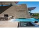 Inviting pool and spa with built-in fire feature at 38300 N 102Nd St, Scottsdale, AZ 85262