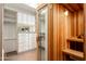 Spacious closet with built-in shelves and a private sauna at 38300 N 102Nd St, Scottsdale, AZ 85262
