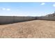 Large, flat backyard space surrounded by a block wall offers privacy and potential at 4041 S 176Th Dr, Goodyear, AZ 85338