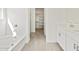 Modern bathroom featuring dual sink vanity, separate tub, and walk-in shower at 4041 S 176Th Dr, Goodyear, AZ 85338
