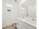 Bathroom features dual sinks and a large mirror at 4041 S 176Th Dr, Goodyear, AZ 85338